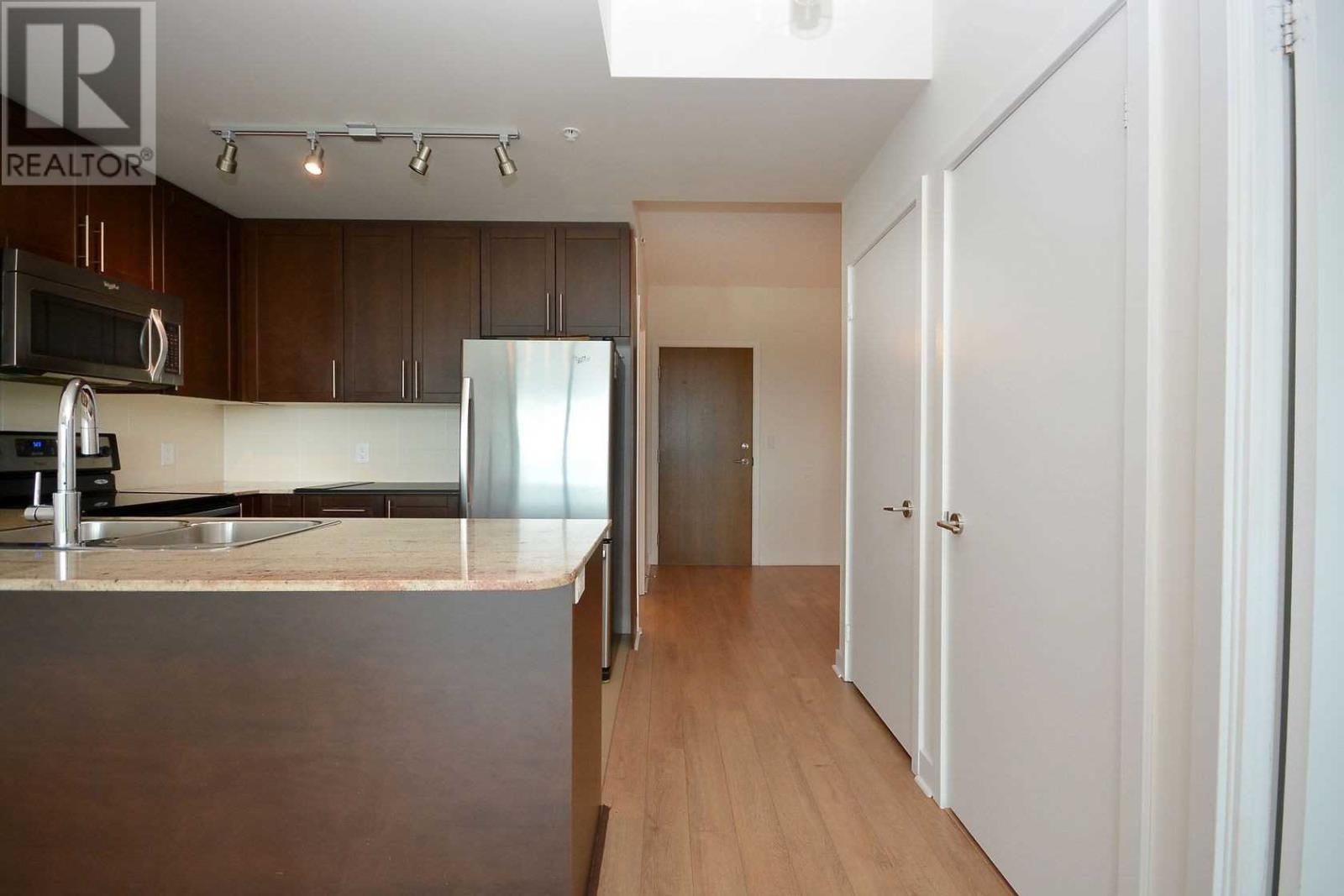 309 – 3985 Grand Park Drive