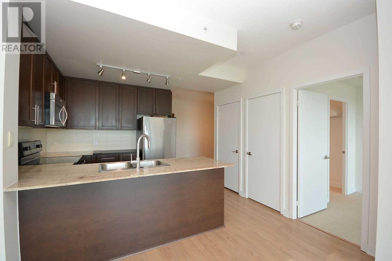 309 – 3985 Grand Park Drive