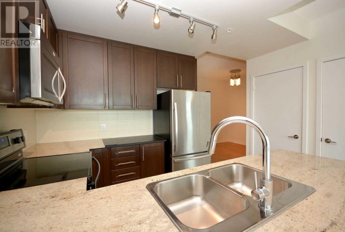 309 – 3985 Grand Park Drive