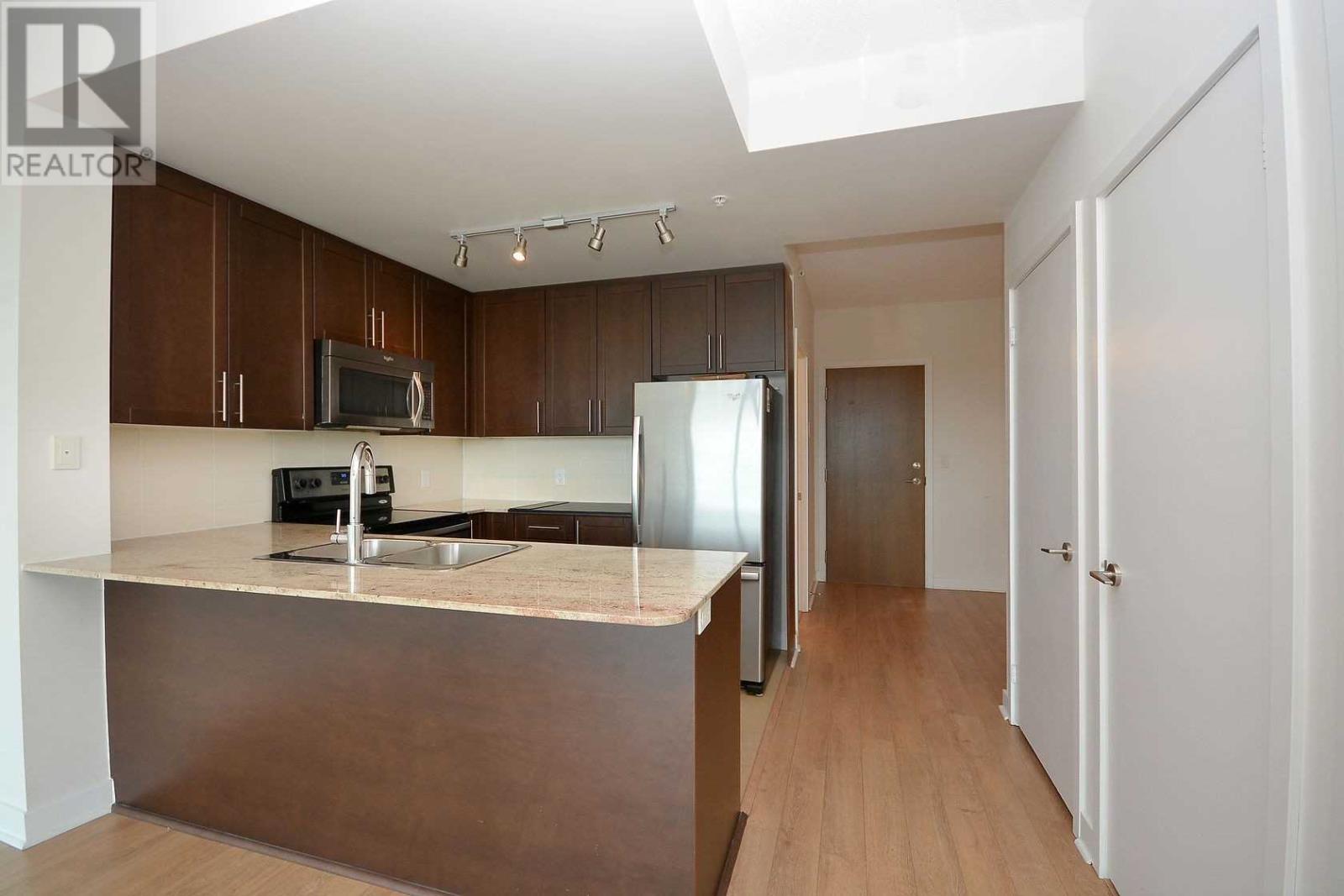 309 – 3985 Grand Park Drive